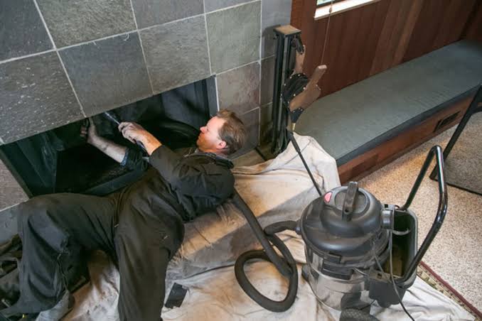 Routine chimney maintenance at a home