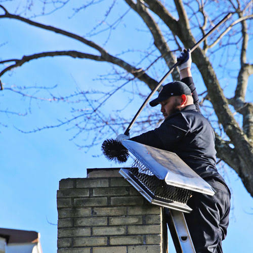 Residential chimney and roof inspected for visible concerns